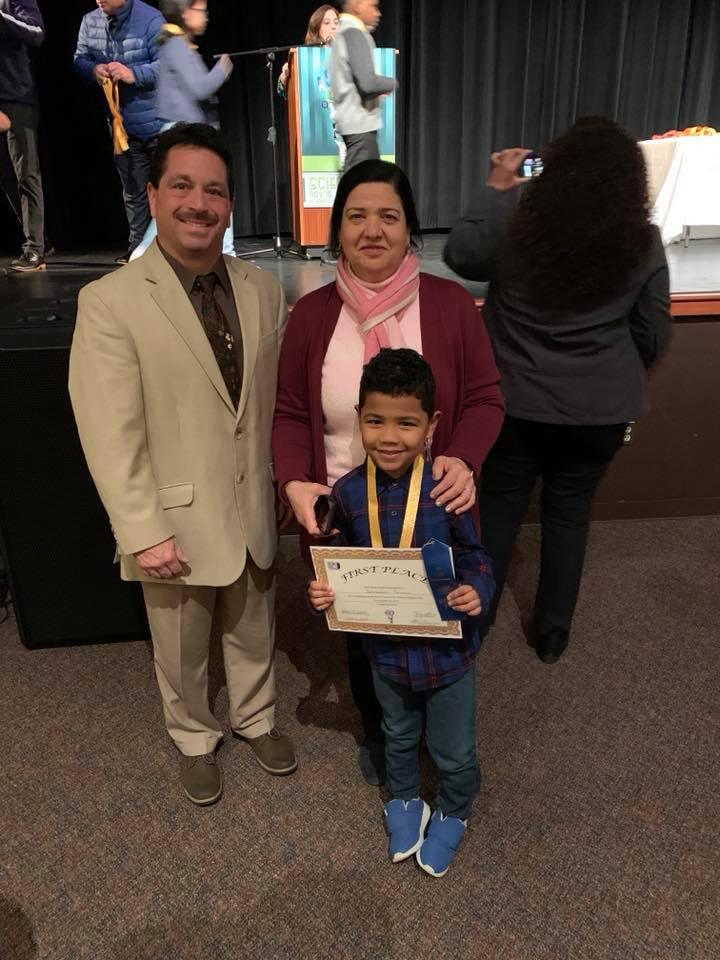 Principal Celebrano, Mrs. Michael and Boy Science Fair Winner