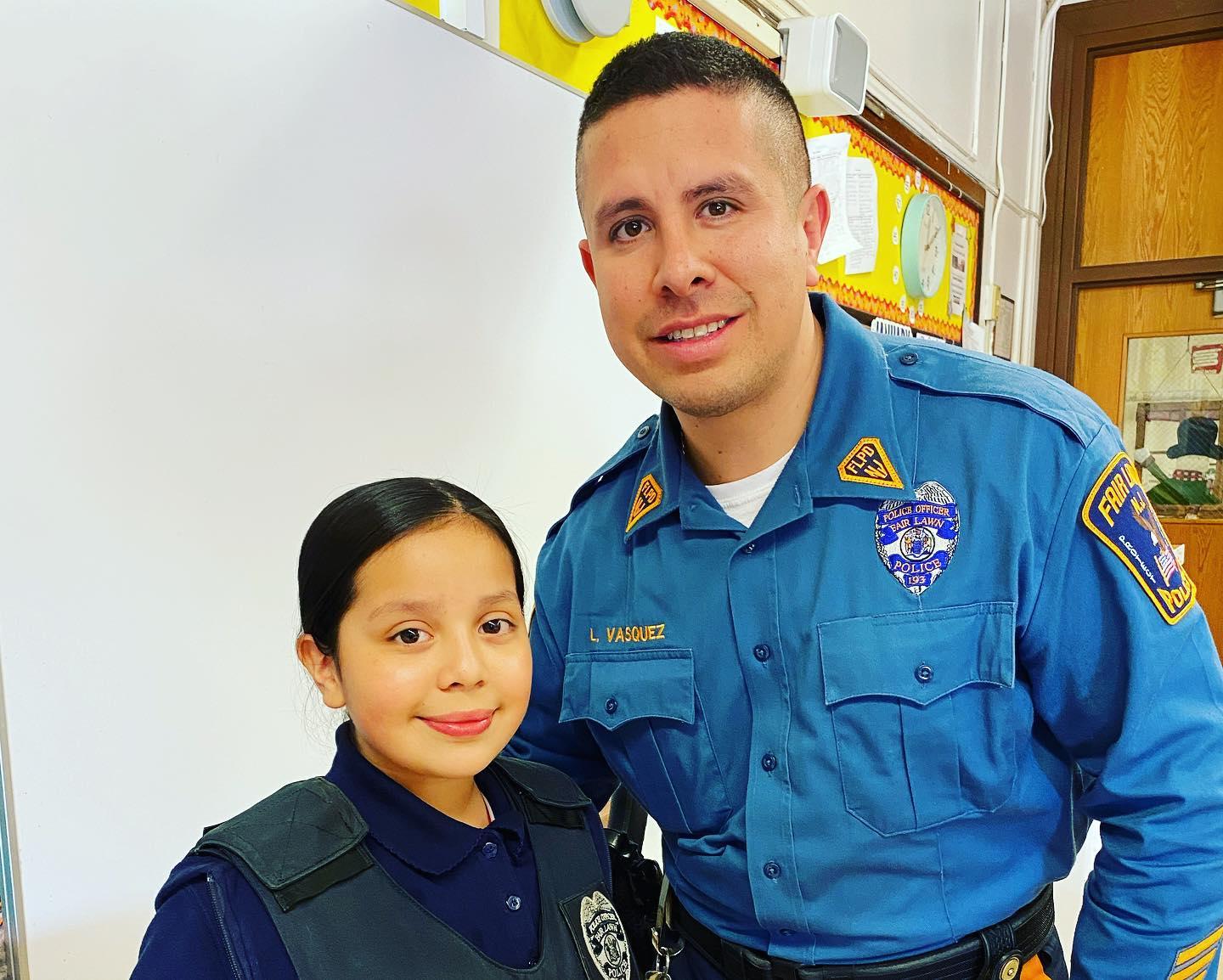 girl with officer Vasquez