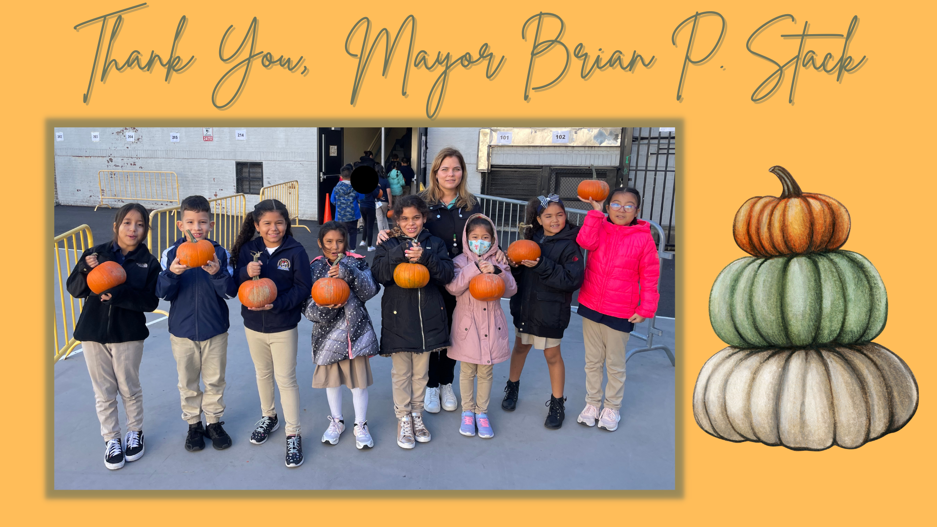 Students enjoying pumpkins and smiling